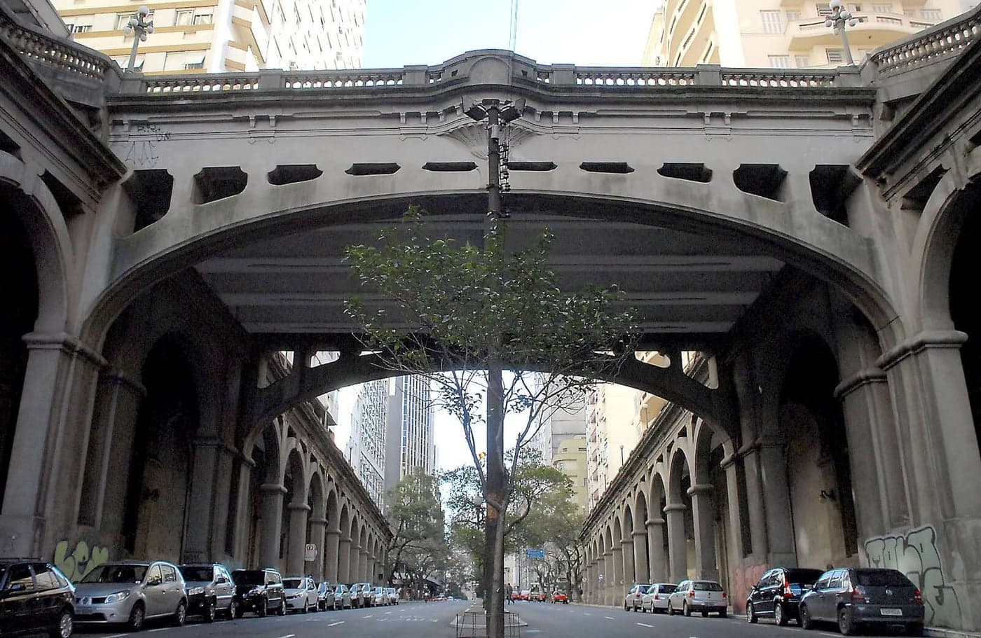 Street level view under the arches of the Viaduto Otávio Rocha on Avenida Borges de Medeiros